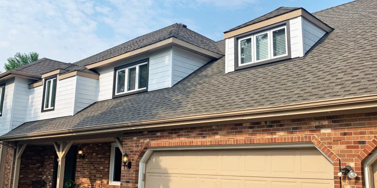 Cedar siding installation and GAF shingle roofing in Downers Grove project photo 1