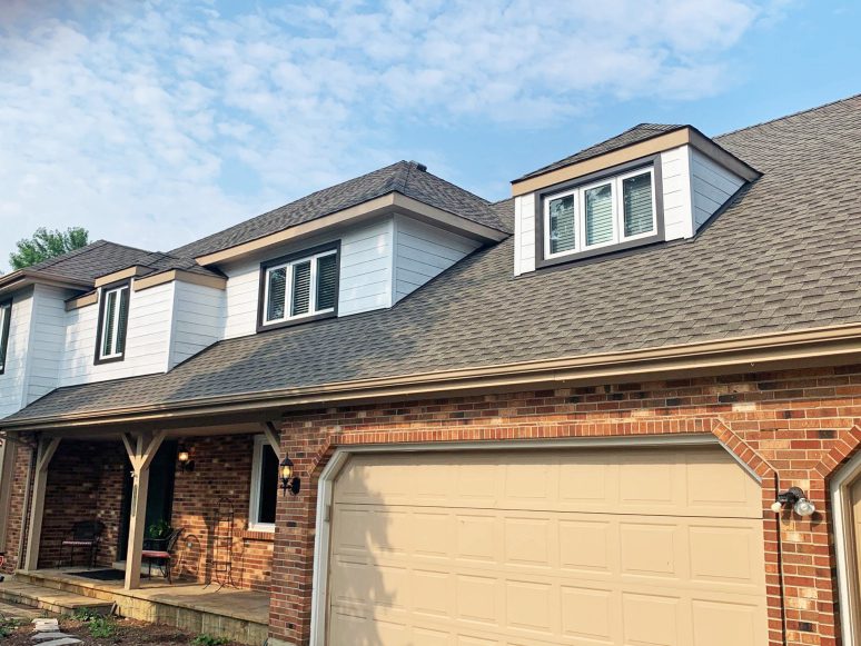 Cedar siding installation and GAF shingle roofing in Downers Grove project photo 1
