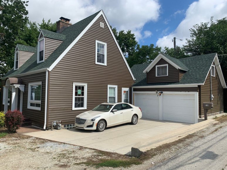 CertainTeed Monogram vinyl siding installation and guttering in Willow Springs project photo 1