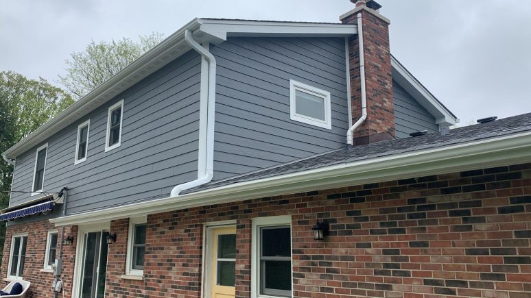 LP SmartSide siding, Atlas Pinnacle shingle roofing and guttering in Hinsdale project photo 2