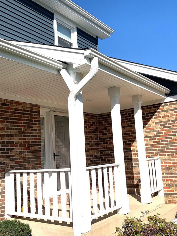 Full exterior remodeling vinyl siding installation shingle roof replacement in Naperville project photo 2