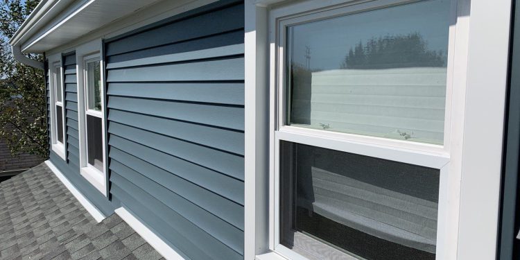 Full exterior remodeling vinyl siding installation shingle roof replacement in Naperville project photo 4