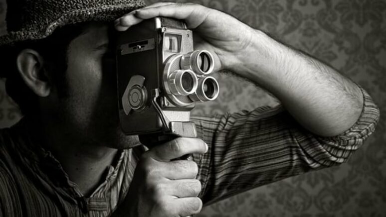 filmaker with vintage camera
