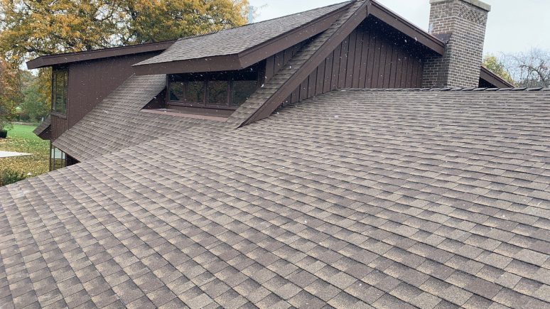 GAF shingle roof installation and guttering in Darien project photo 1