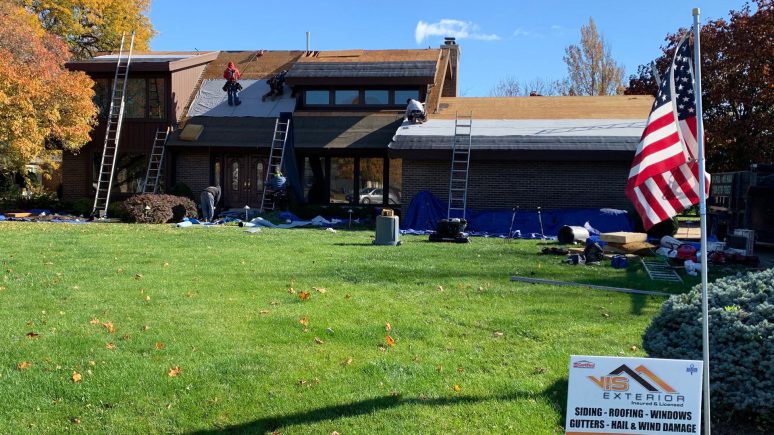 GAF shingle roof installation and guttering in Darien project photo 4