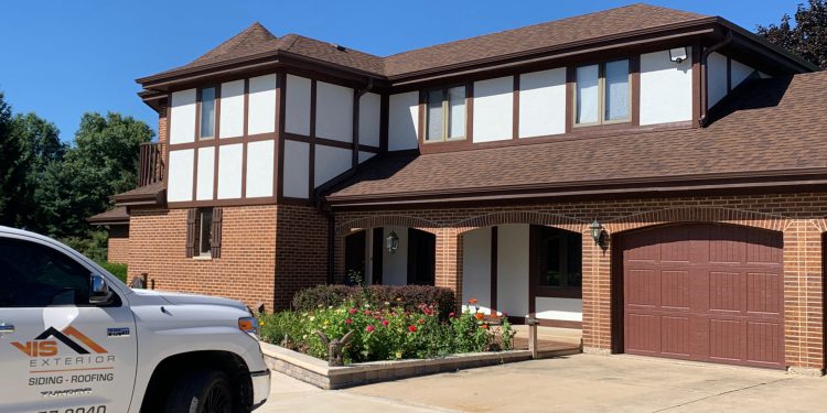 James Hardie Stucco Panel Vertical siding installation in Wayne project photo 1