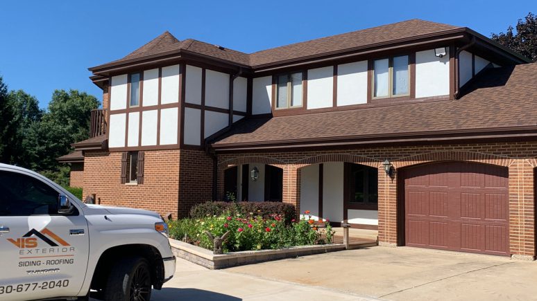 James Hardie Stucco Panel Vertical siding installation in Wayne project photo 1