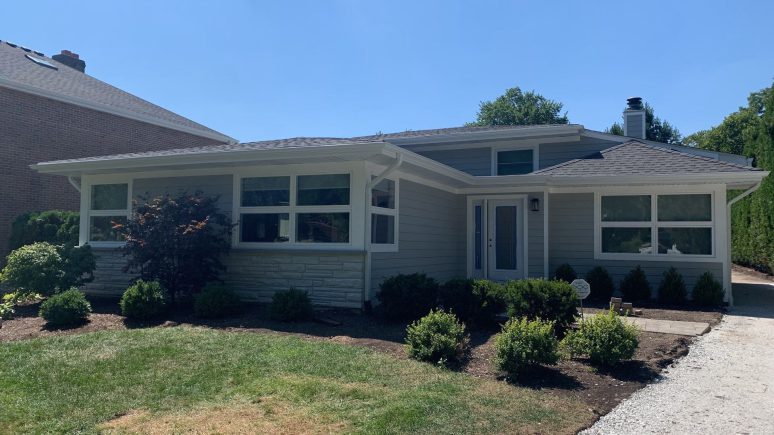 LP SmartSide siding installation and shingle roof replacement in Hinsdale project photo 1