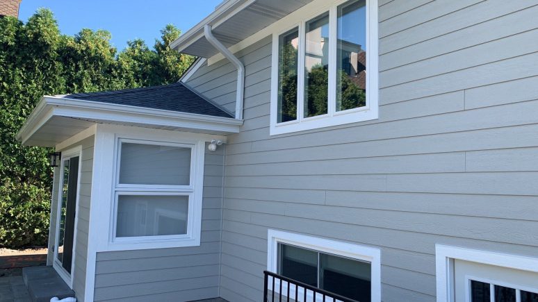 LP SmartSide siding installation and shingle roof replacement in Hinsdale project photo 2