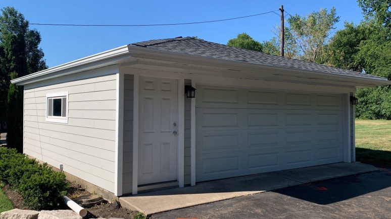 LP SmartSide siding installation and shingle roof replacement in Hinsdale project photo 3