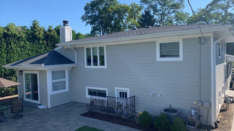 LP SmartSide siding installation and shingle roof replacement in Hinsdale project photo 4