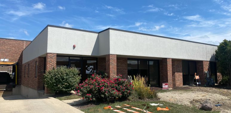 office building stucco exterior repainting