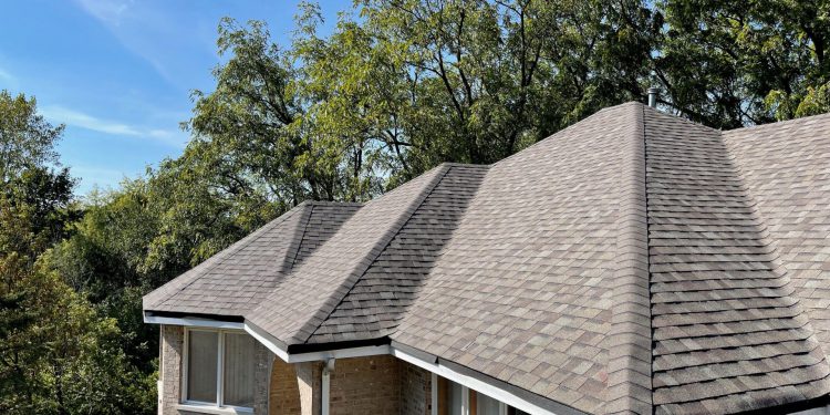 Old roof replacement installing Owens Corning architectural shingles and new gutters in Homer Glen project photo 5