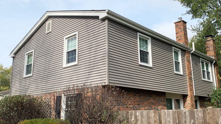 Royal Estate vinyl siding installation, windows and gutters installation in Naperville project photo 1