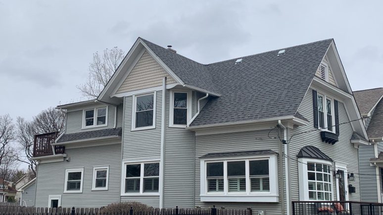 Royal Estate siding installation and shingle roof replacement in Arlington Heights project photo 1