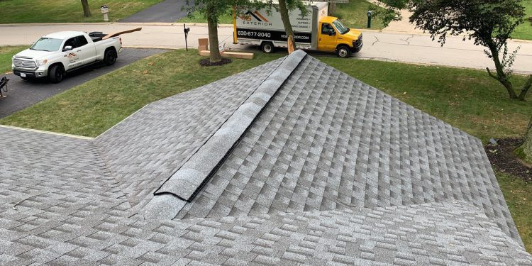 Royal Estate siding installation and shingle roof replacement in Darien project photo 2