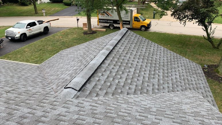 Royal Estate siding installation and shingle roof replacement in Darien project photo 2