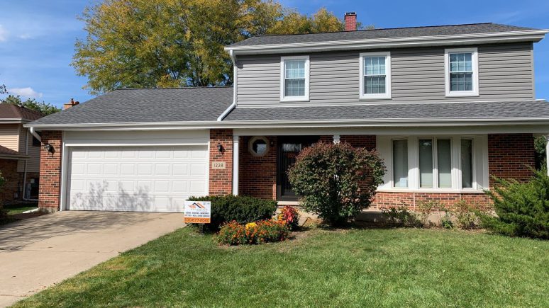 Royal Estate siding installation and shingle roof replacement in Woodridge project photo 1