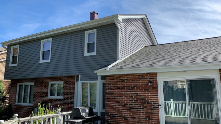 Royal Estate siding installation and shingle roof replacement in Woodridge project photo 2