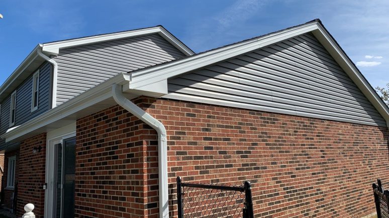 Royal Estate siding installation and shingle roof replacement in Woodridge project photo 3