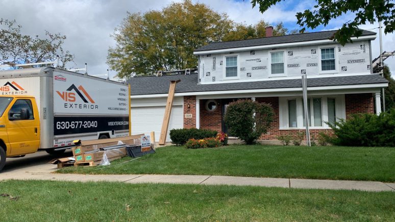 Royal Estate siding installation and shingle roof replacement in Woodridge project photo 4