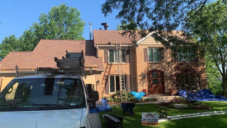 Shingle roofing replacement after hail damage in Naperville project photo 1