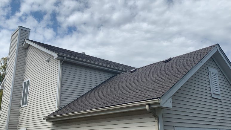 Complete roof and siding replacement after wind-damage in Plainfield project photo 2