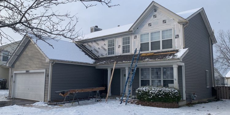 Complete roof and siding replacement after wind-damage in Plainfield project photo 4