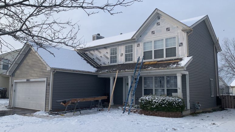 Complete roof and siding replacement after wind-damage in Plainfield project photo 4