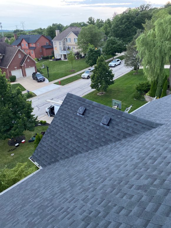 Shingle roof replacement and gutters in Willow Springs project photo 2