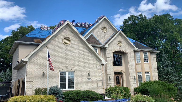 Shingle roof replacement and gutters in Willow Springs project photo 4