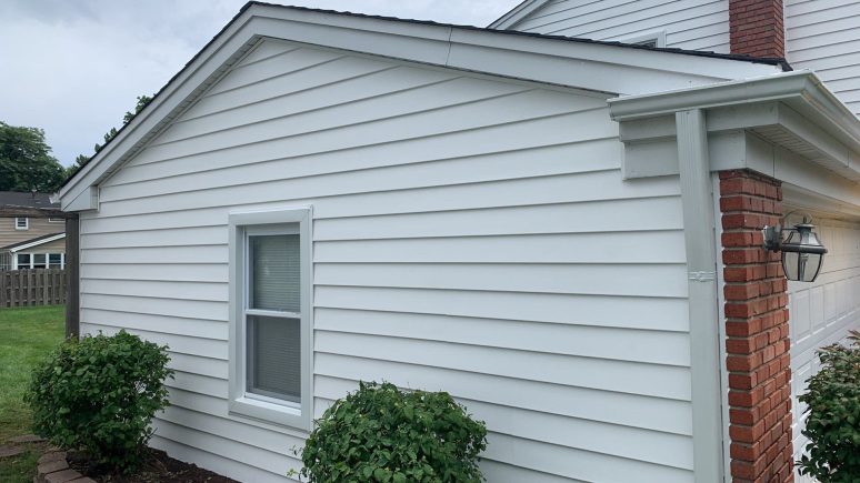 Vinyl siding installation & gutters replacement after hail damage in Downers Grove project photo 4