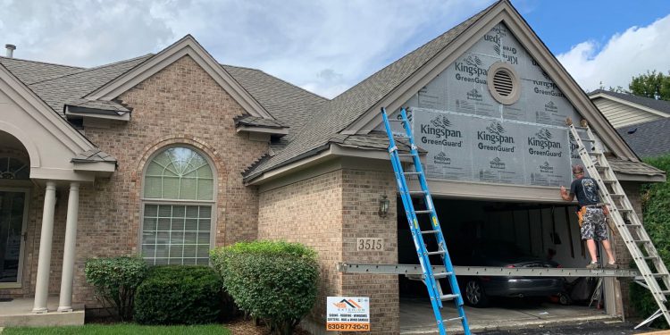Vinyl siding & shingle roofing after hail damage in Naperville project photo 3