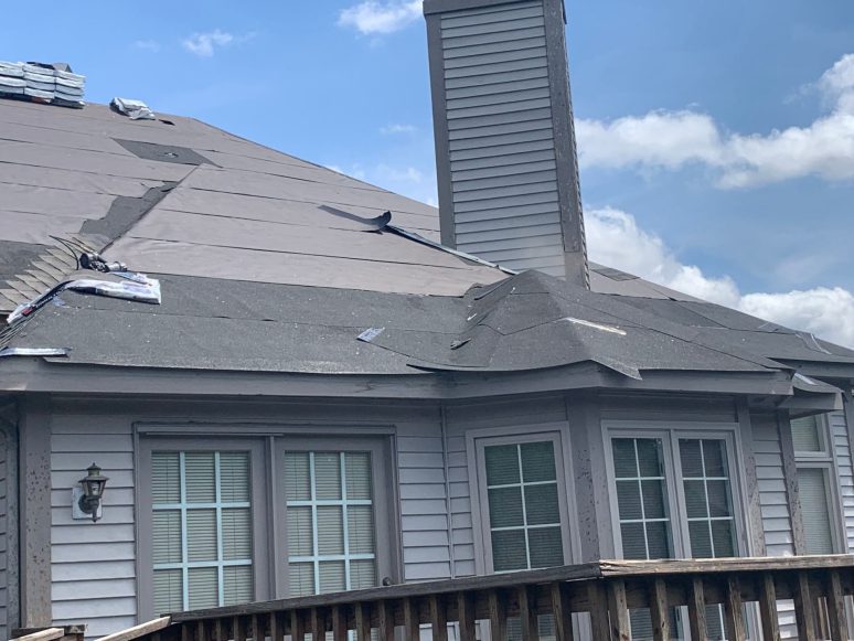 Vinyl siding & shingle roofing after hail damage in Naperville project photo 4