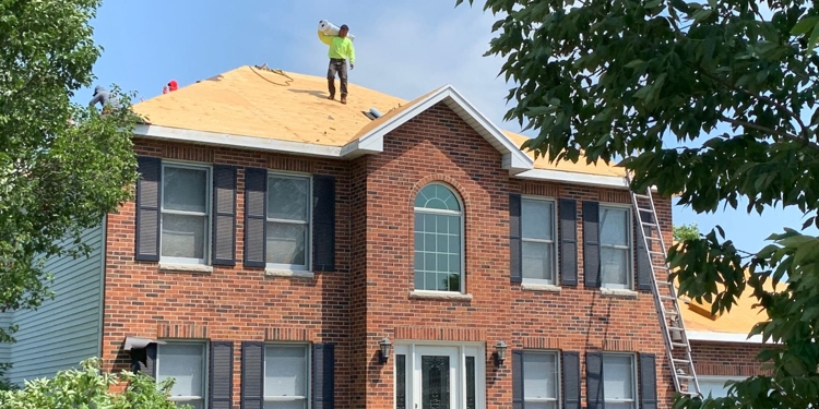 vinyl siding roofing replacement after hail damage