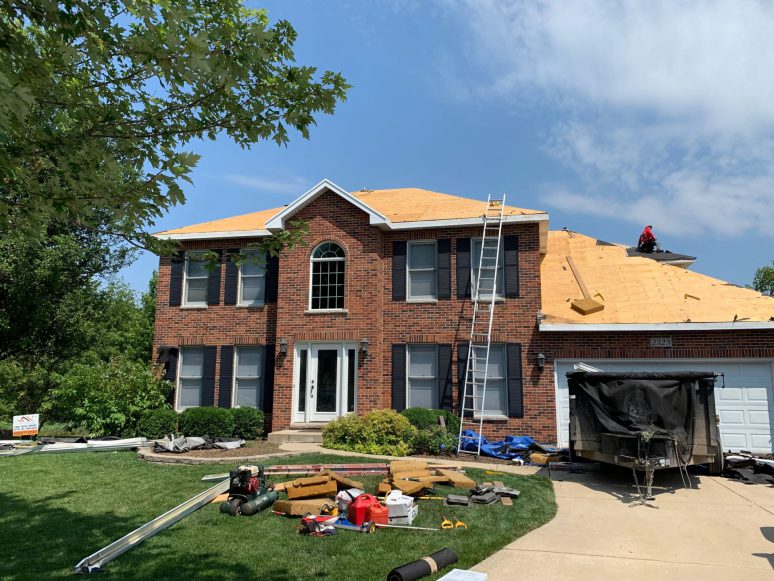 Vinyl siding, roofing & gutters replacement after hail damage in Naperville project photo 4