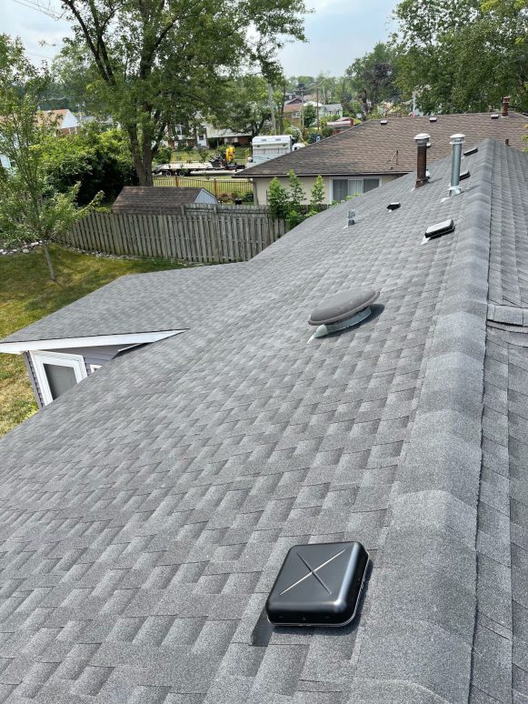 Vinyl siding and shingle roof replacement after hail damage in Woodridge project photo 2