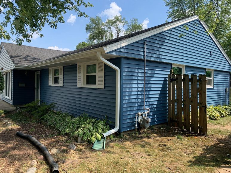 Vinyl siding and shingle roof replacement after hail damage in Woodridge project photo 4