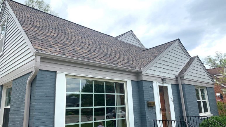 Vinyl siding installation and shingle roof replacement after hail damage in Clarendon Hills project photo 1