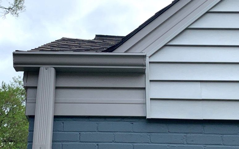 Vinyl siding installation and shingle roof replacement after hail damage in Clarendon Hills project photo 4
